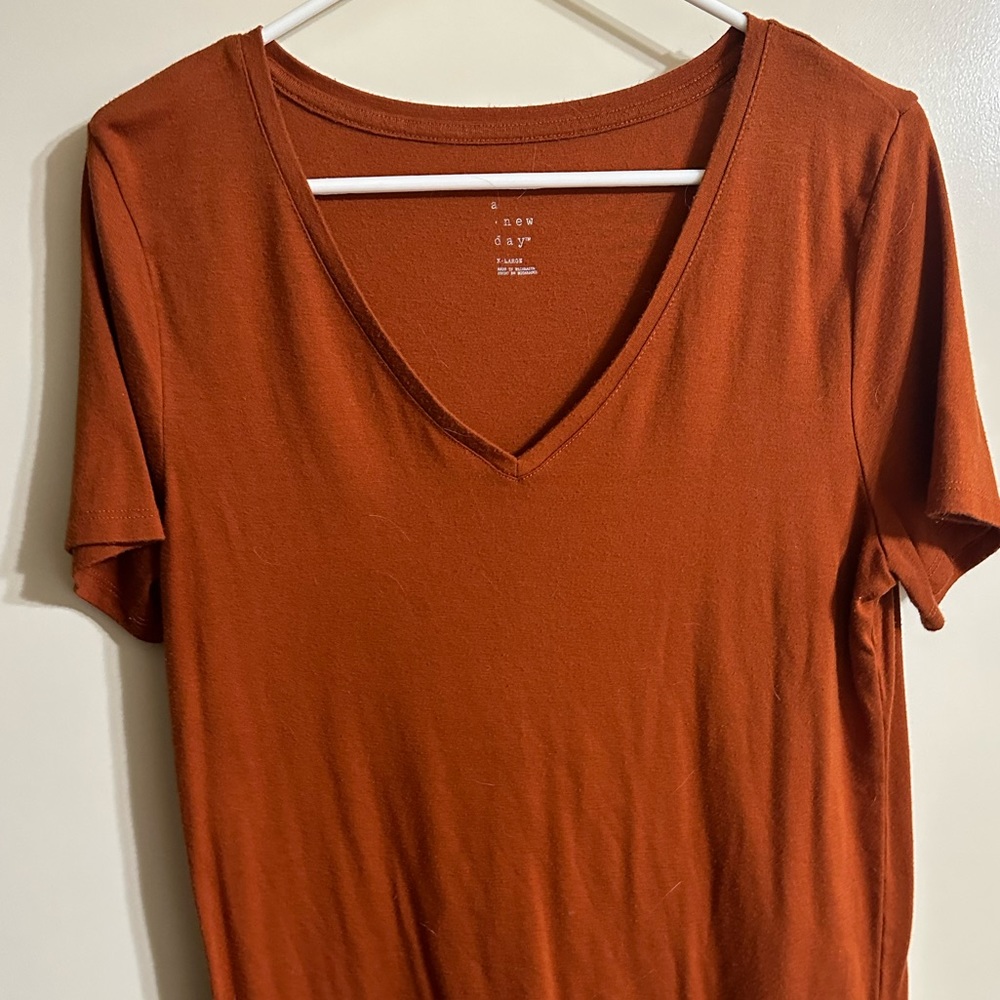 A new day orange v neck t shirt